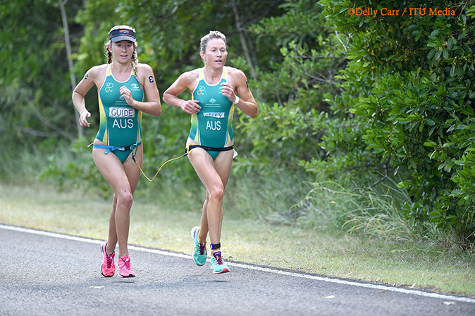 Katie-Kelly-R-with-guide-Laura-Cook