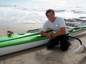 nathan henderson prepares his outrigger for 70k paddle photo hmg.jpg