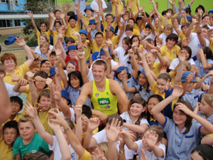 stuart snell in the middle of all the kids photo hmg.jpg
